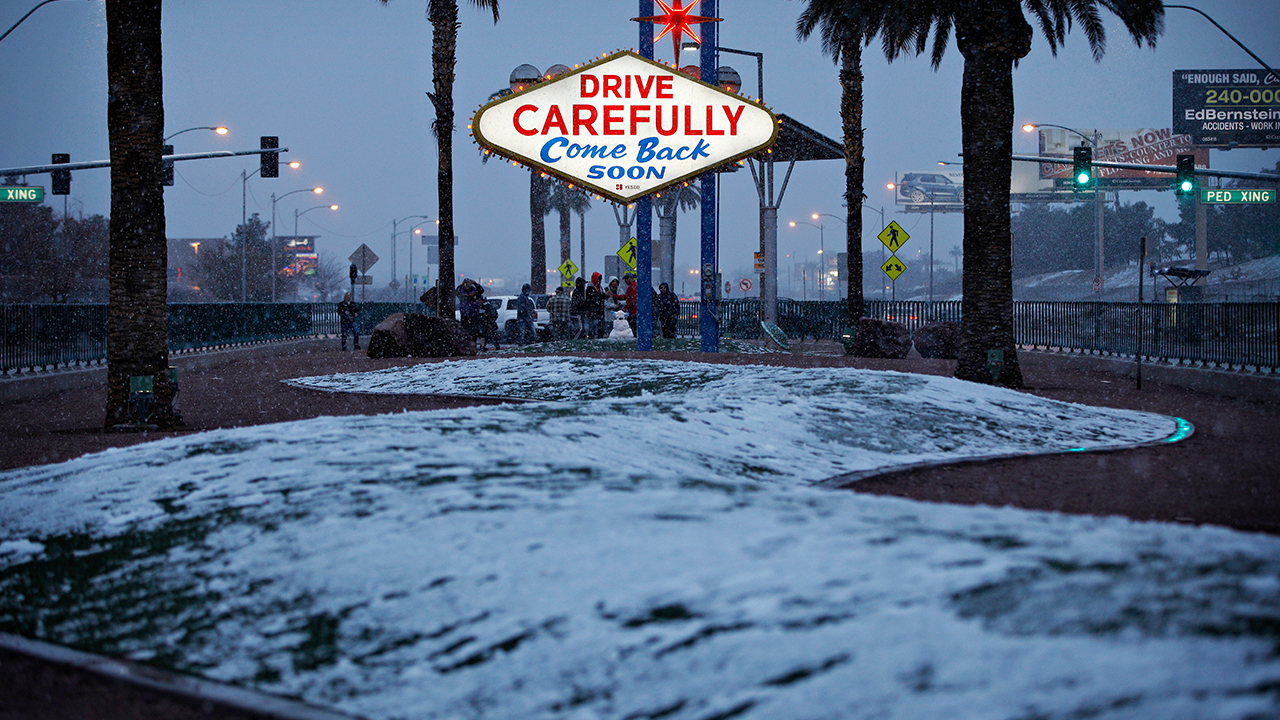 Snow covering an area where the Las Vegas sign is